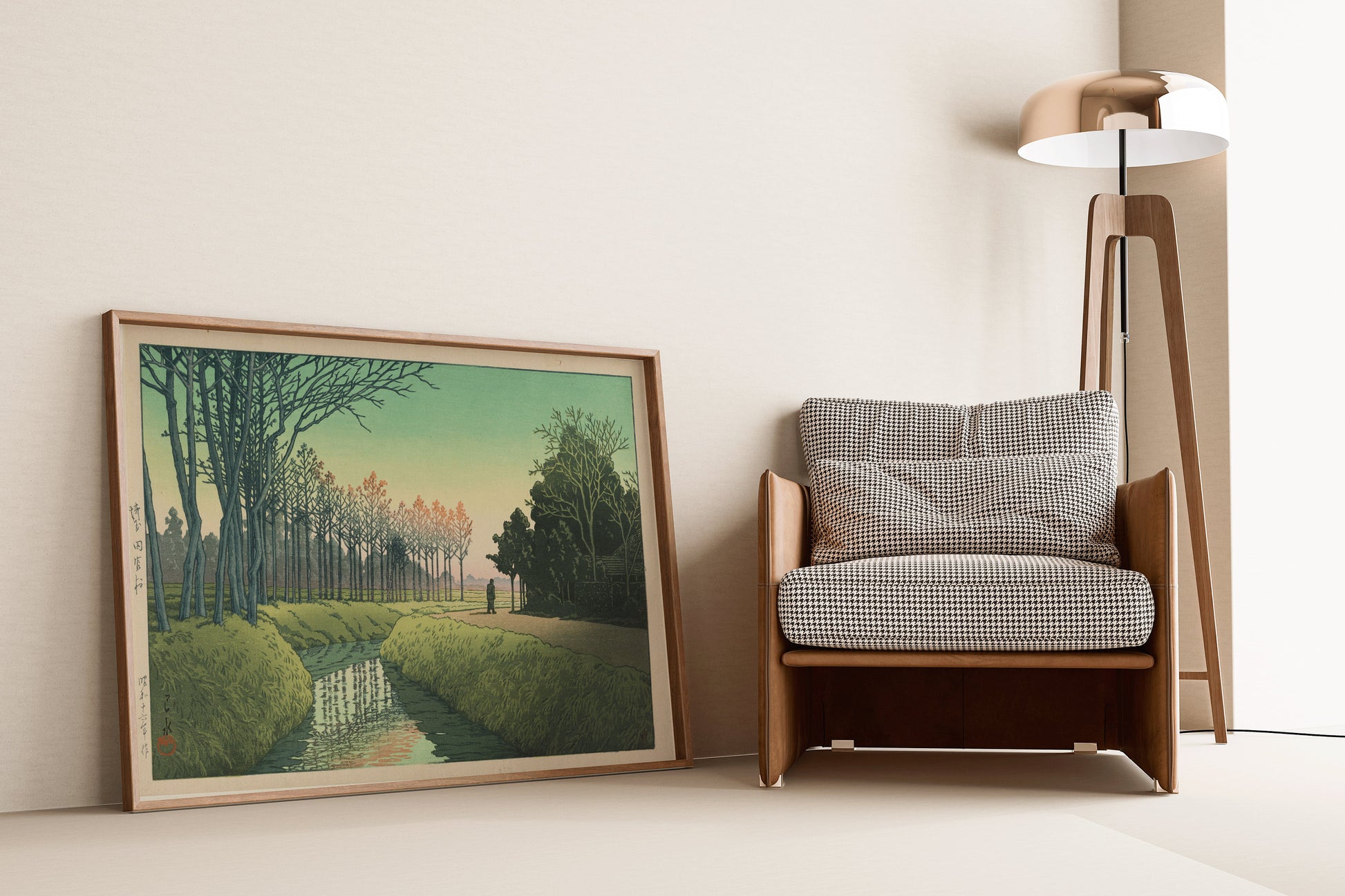 Kawase Hasui's "Tamiya Village, Saitama" framed woodblock print displayed in a stylish modern living room setting.