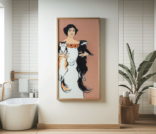 Edward Penfield vintage art print of a woman holding cats in a narrow vertical frame, enhancing a modern bathroom setting.