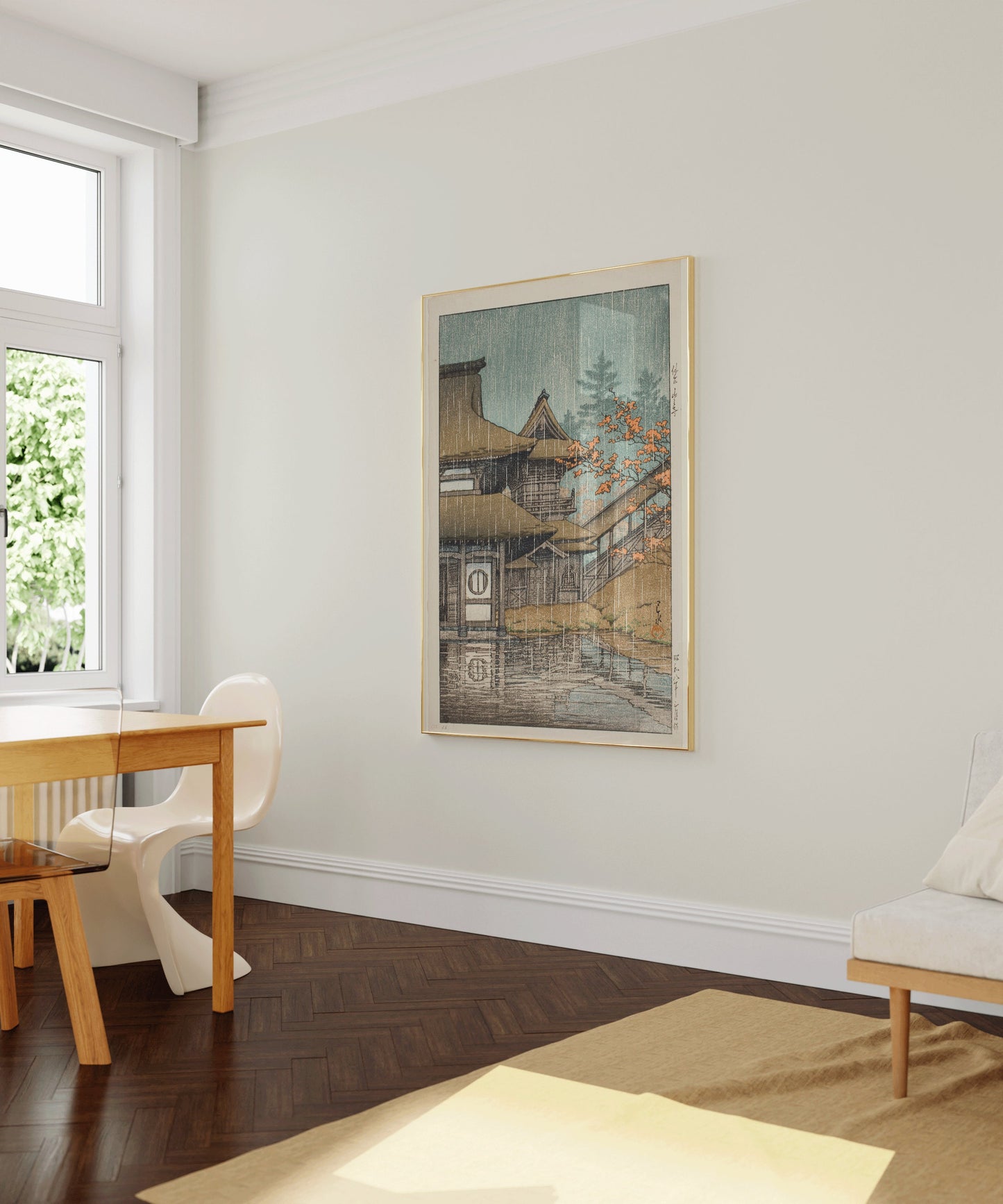 Framed Kawase Hasui Mountain Temple woodblock print in a modern living room setting with light streaming through a window.