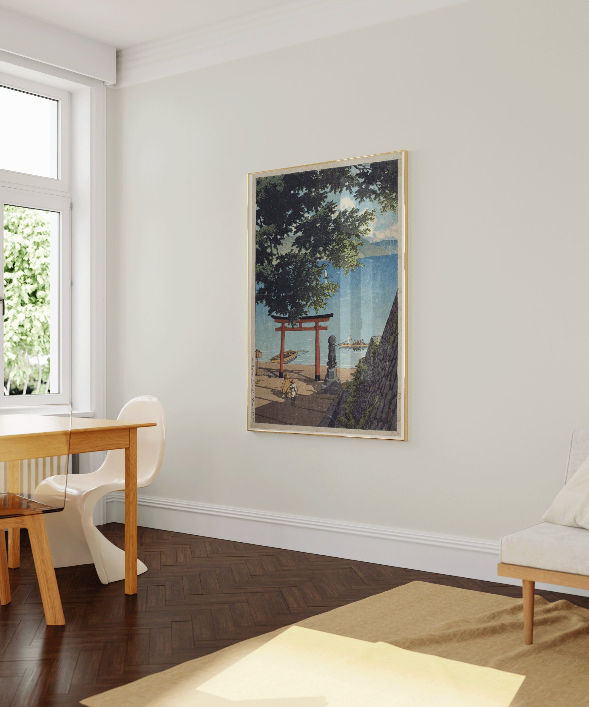 "Kawase Hasui woodblock art in frame, hanging in a modern living space with natural light."