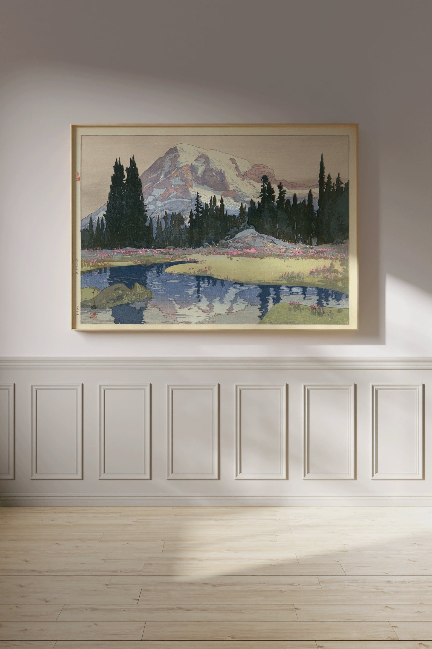 Vintage Japanese woodblock print of Mount Rainier by Hiroshi Yoshida, displayed in a room with soft lighting.