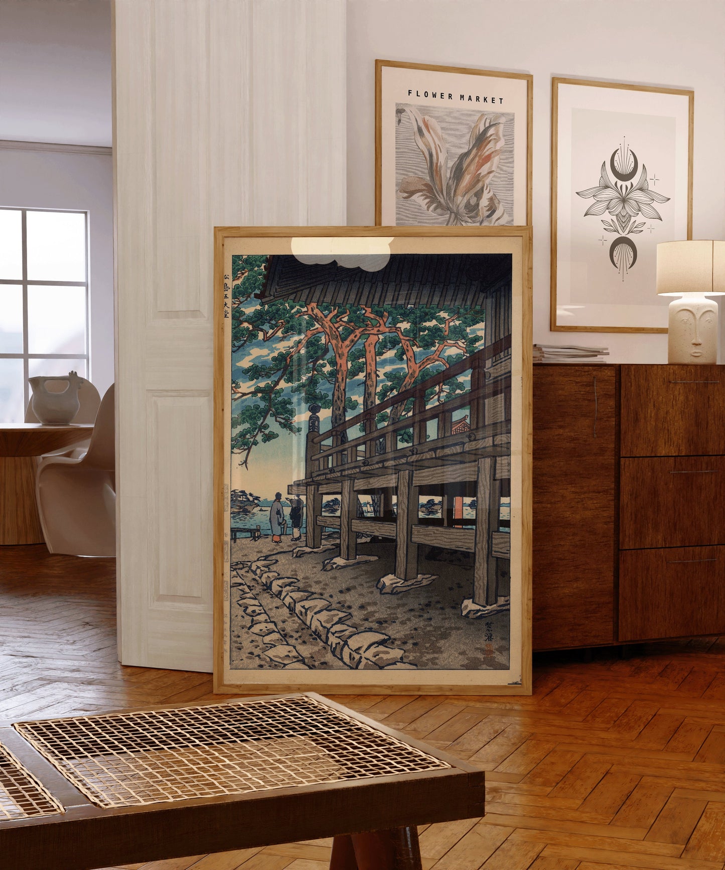 Vintage Shiro Kasamatsu Godaido Pagoda art print in a modern living room, framed in Nude Oak wood.