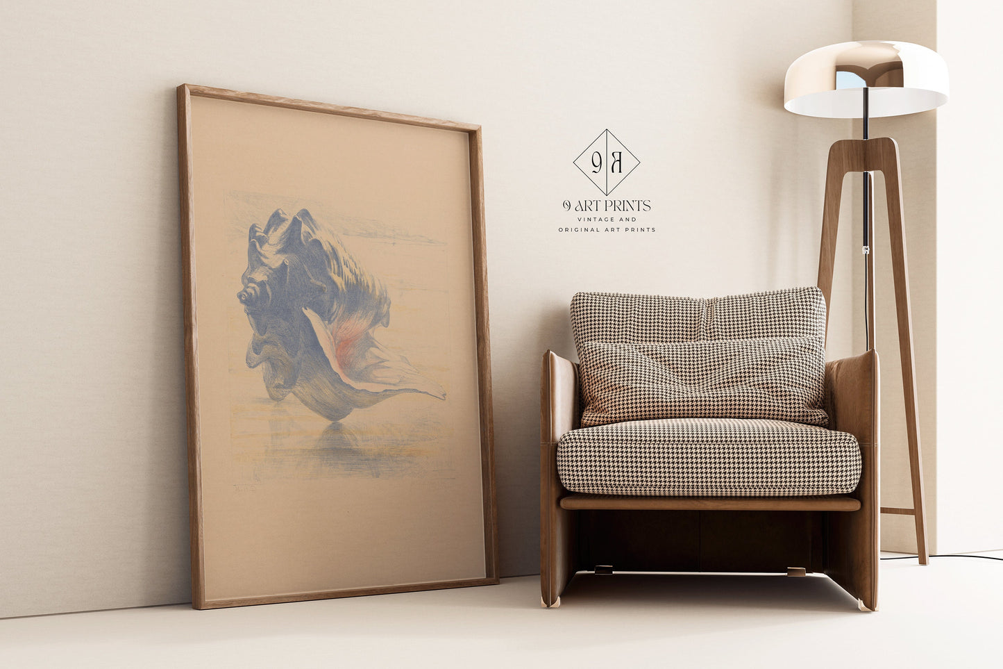 Shell sketch art in beige and blue, framed beside a chair and lamp, elevating home decor with fine art prints.