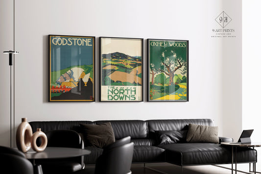 Set of 3 framed vintage London Underground posters by Edward McKnight Kauffer displayed in a modern living room.