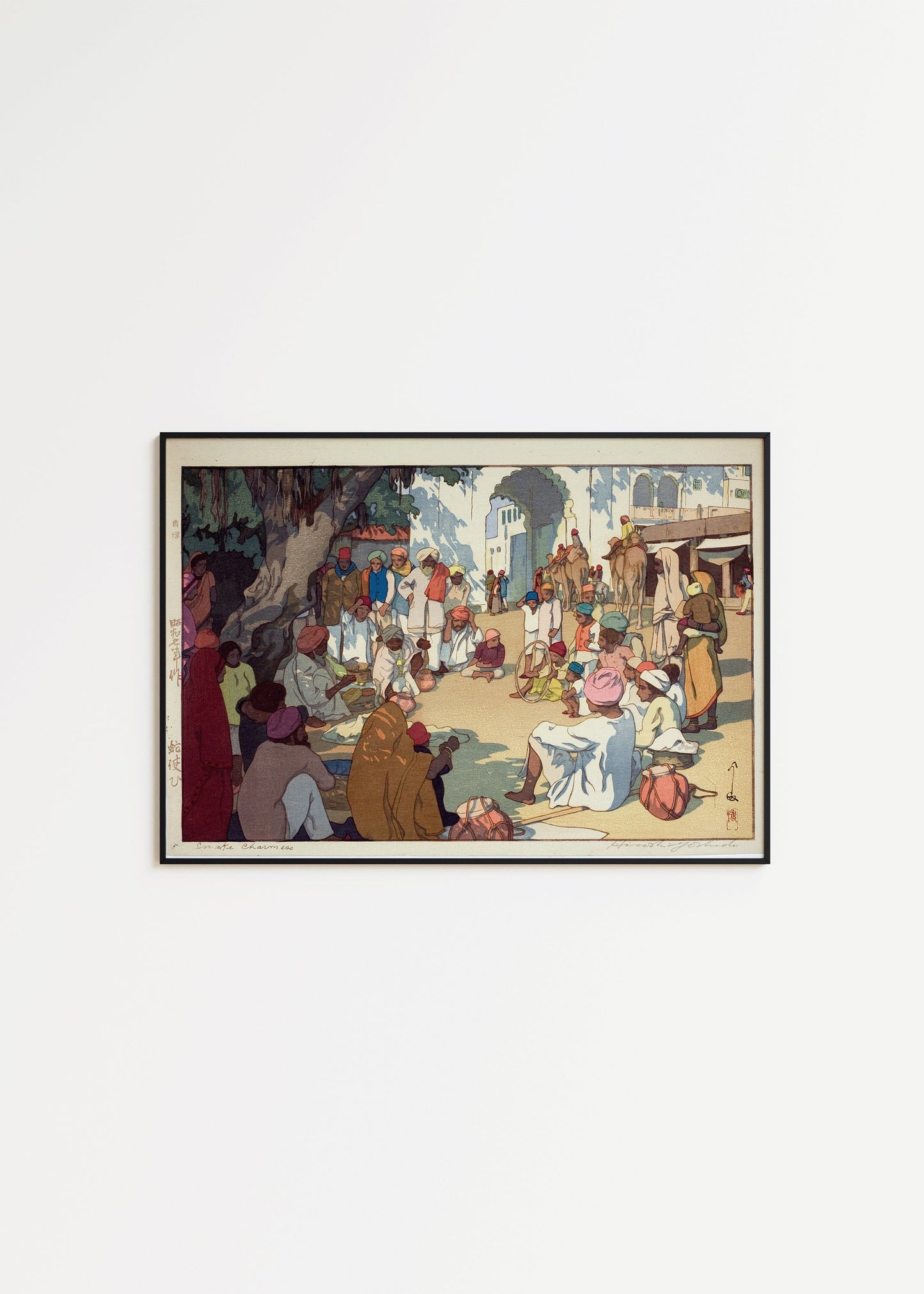 Vintage Japanese woodblock art "The Snake Charmer" by Hiroshi Yoshida, depicting Indian market scene, available framed or unframed.