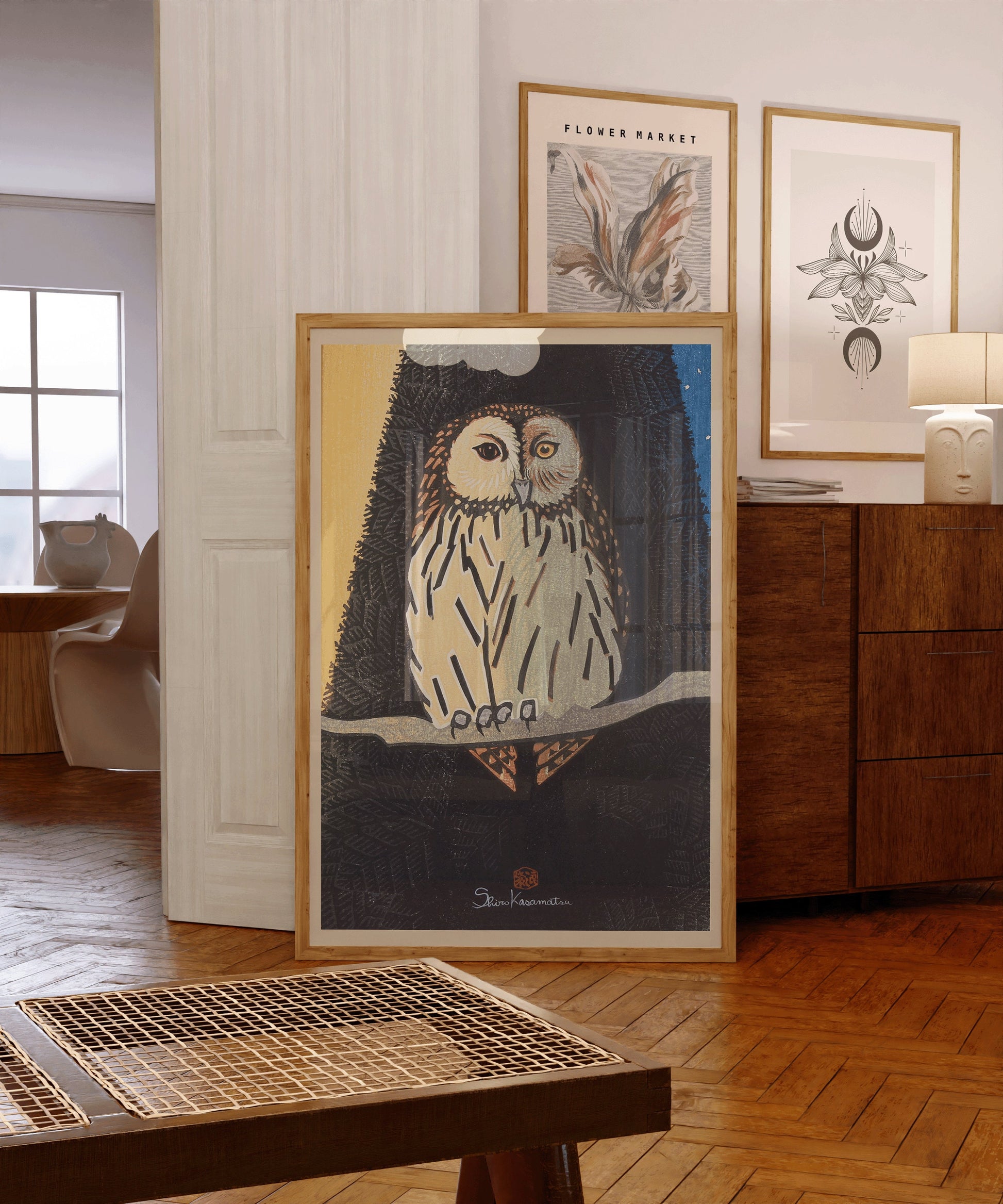 Shiro Kasamatsu Owl woodblock art in blue displayed in elegant room with natural lighting and framed options for vintage decor.