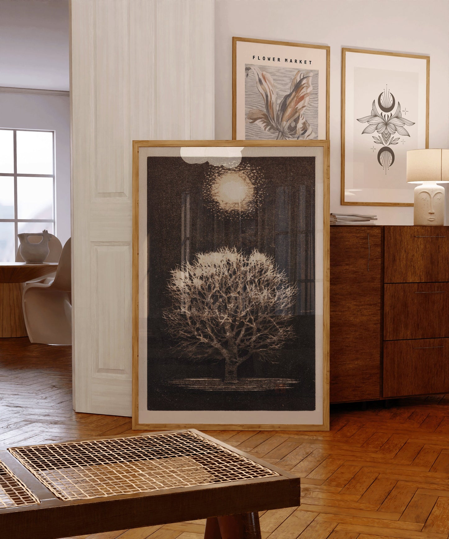 Joichi Hoshi vintage woodblock art "Tree Under Moon" displayed in elegant framed setting, enhancing interior decor.