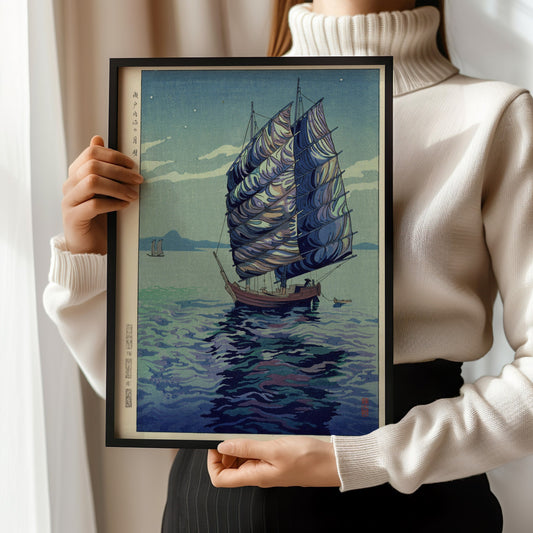 Okazaki Shintaro's vintage woodblock print "Moonlight Over the Inland Sea" in blue, displayed in a bespoke frame.