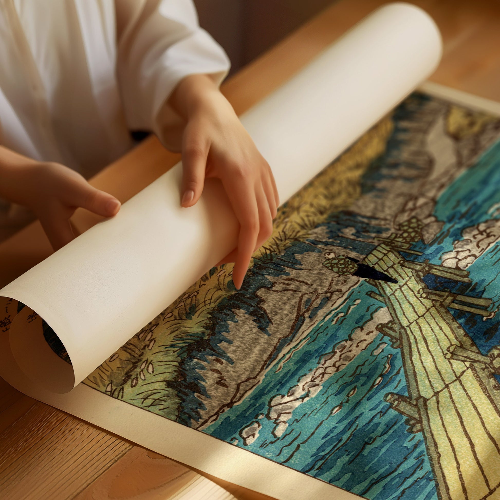 Handcrafted Shiro Kasamatsu art print, Bridge at Musashi, Arashiyama, being unrolled on wooden table, ready for framing.