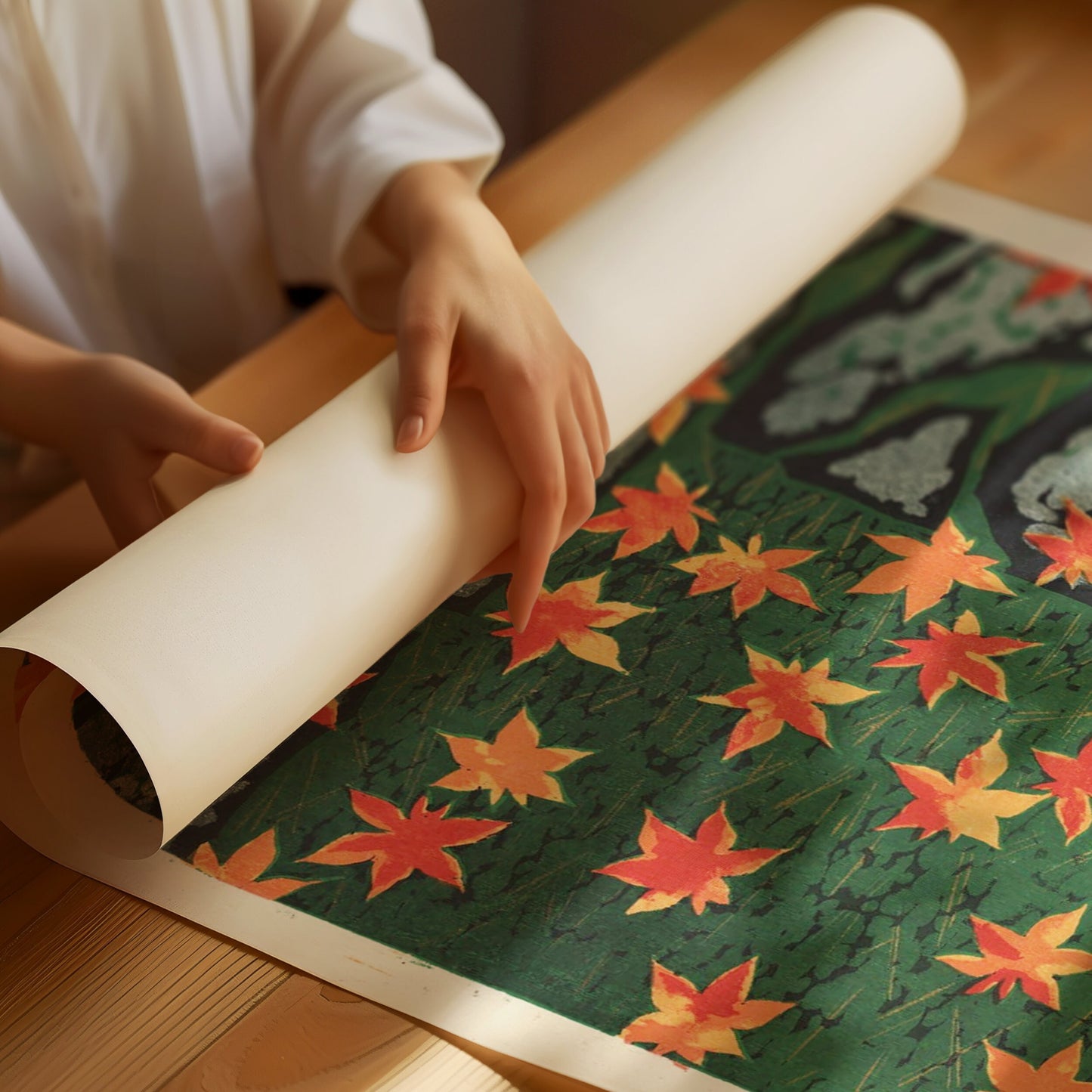 Person unrolling Shiro Kasamatsu's "Moss and Maple" Japanese art print featuring vibrant autumn leaves.