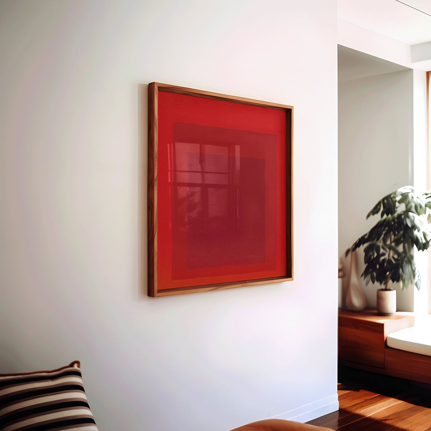 Josef Albers RED Homage to the Square print in living room, mid-century modern style, framed in handcrafted oak.