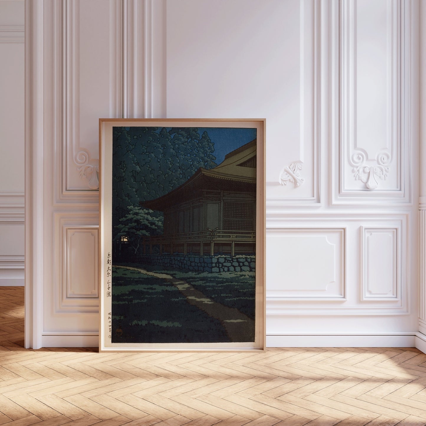 Vintage Japanese woodblock art print of Sanzen Temple, Kyoto, framed in nude oak, displayed in elegant room with parquet floor.