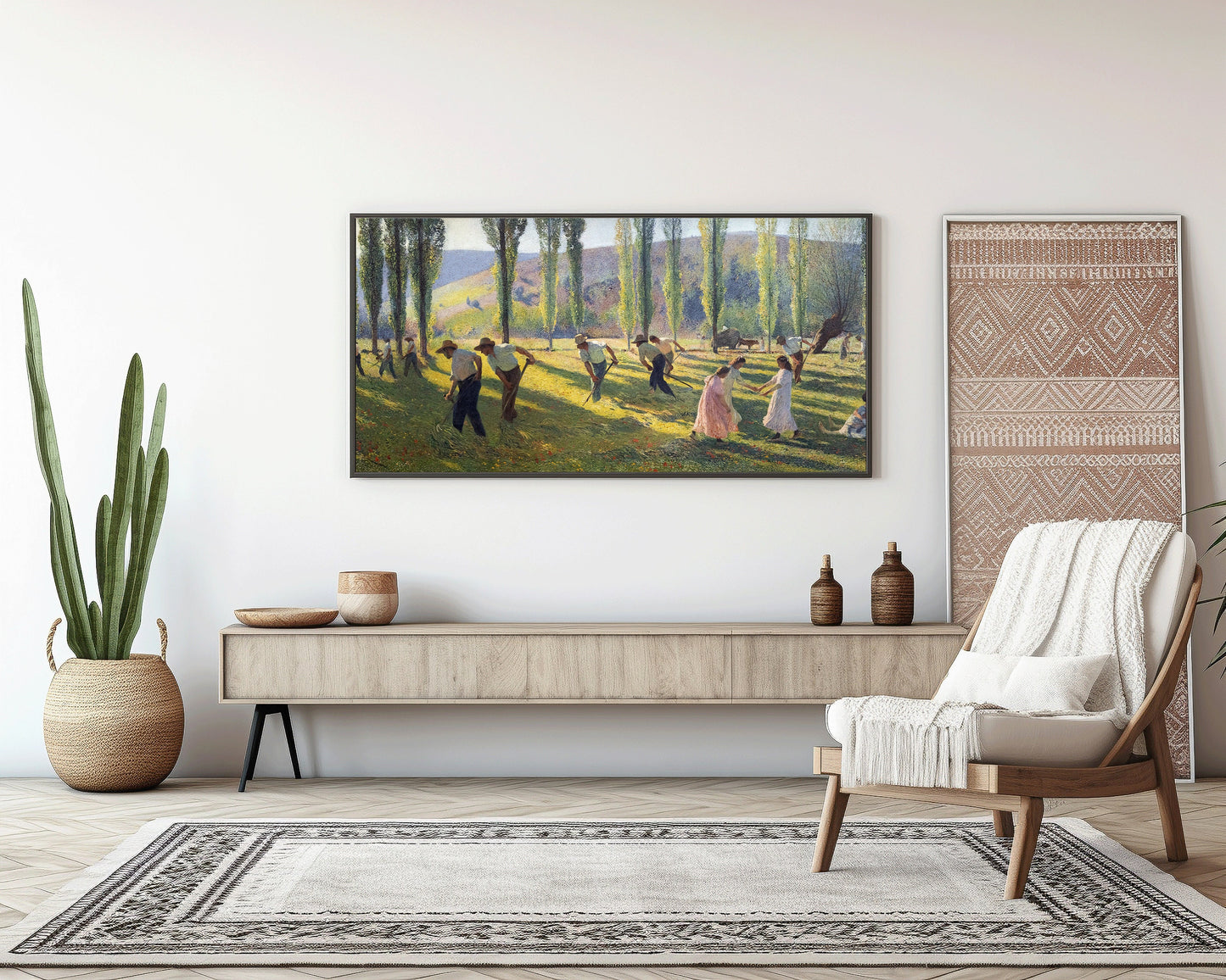 Vintage Impressionist art print of Henri Martin's "Mowers or Summer" displayed in a modern living room, framed and ready to elevate decor.