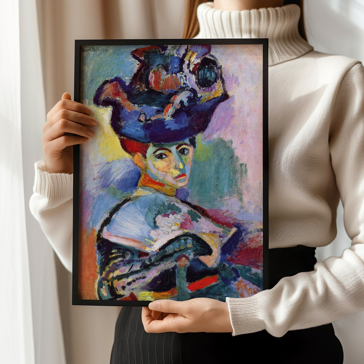 "Henri Matisse Woman with a Hat art print held by person, available framed or unframed, museum-quality fine art print options"