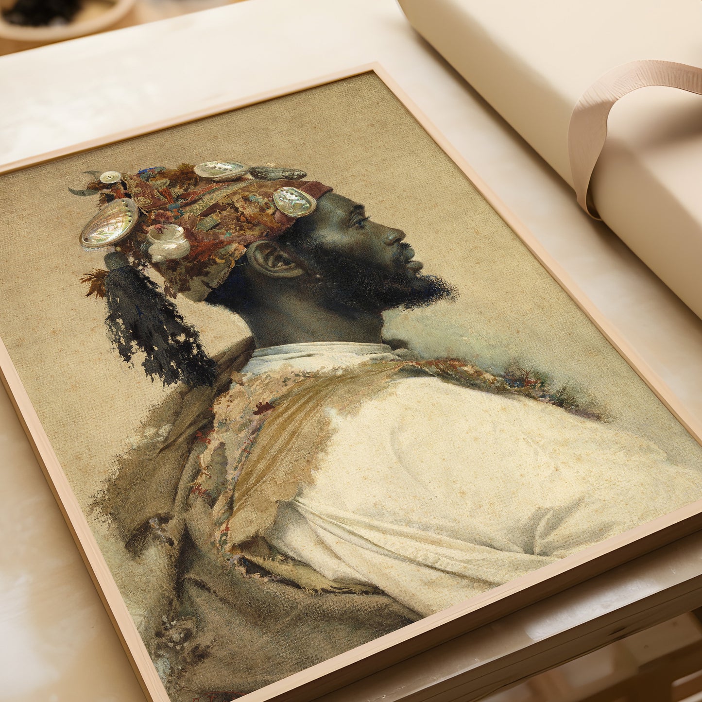 Portrait of a Moorish man in profile, vintage Orientalist art by Josep Tapiró i Baró, displayed in a handcrafted frame.