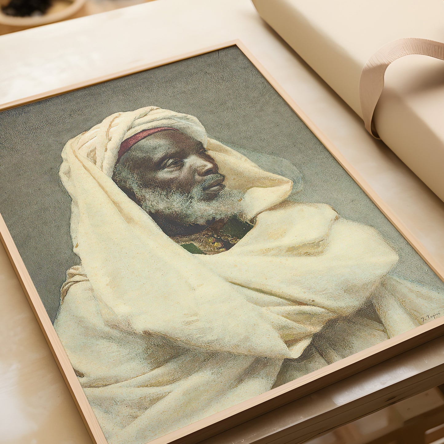 Vintage Orientalist portrait of a Moorish man in an elegant frame, showcasing museum-quality fine art by Josep Tapiró i Baró.