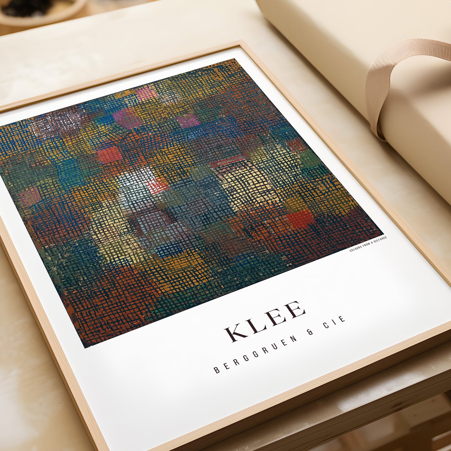 Paul Klee abstract art print in wooden frame, museum-quality modern artwork, handcrafted with FSC-certified wood, on a table.