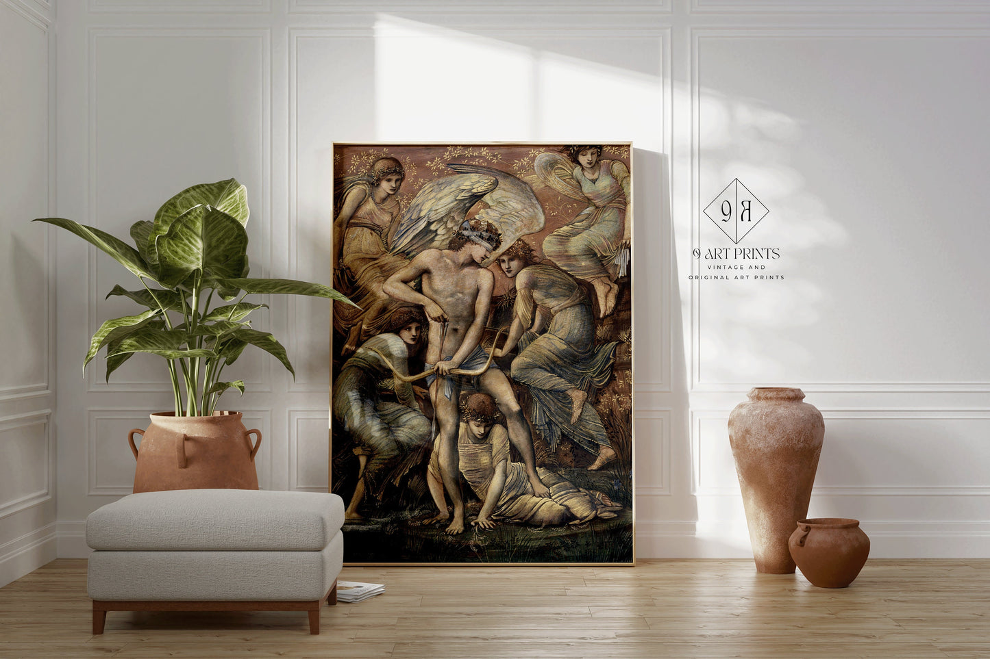 Edward Burne-Jones Cupid's Hunting Grounds framed art print displayed in elegant modern living room.