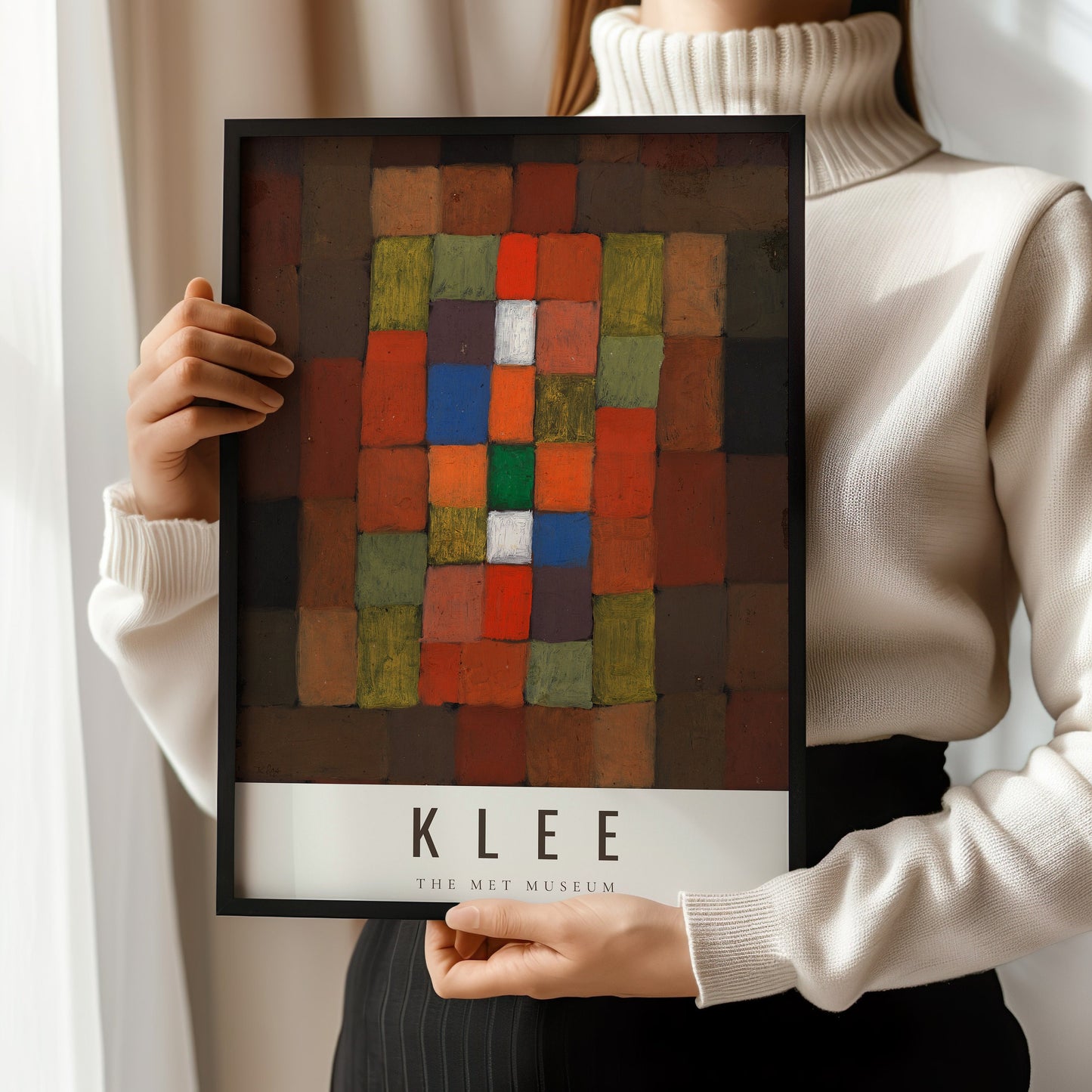 Person holding framed Paul Klee Static Dynamic Gradation print, modern abstract art for home decor.