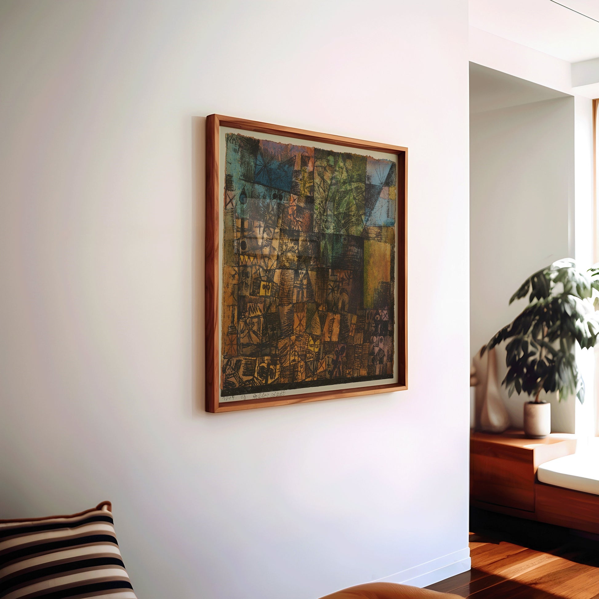 City of Graves by Paul Klee, mid-century modern abstract art print, framed, hanging in a stylish living room.