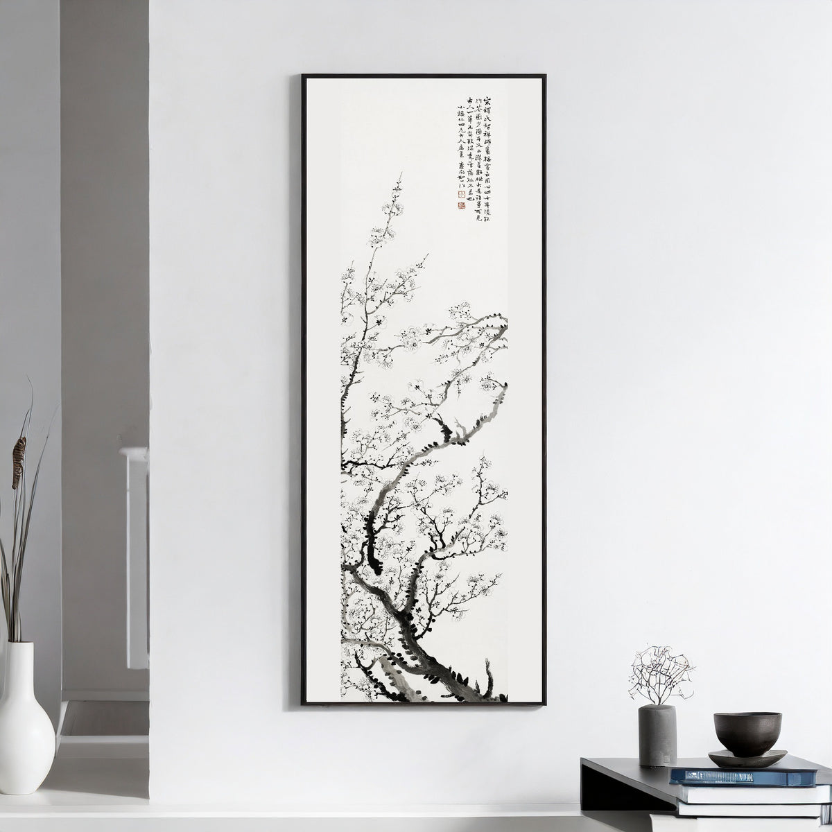 Cherry Blossoms, from a set of four by Rushan — framed on a white wall above books and a bowl