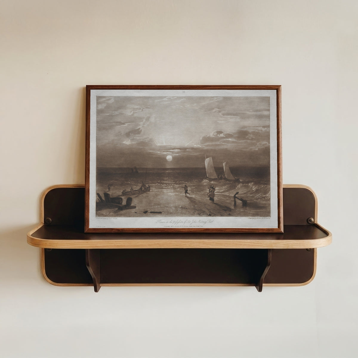 Framed art print of Liber Studiorum: Mildmay Sea-piece by J.M.W. Turner, in a dark wood frame resting on a wall shelf