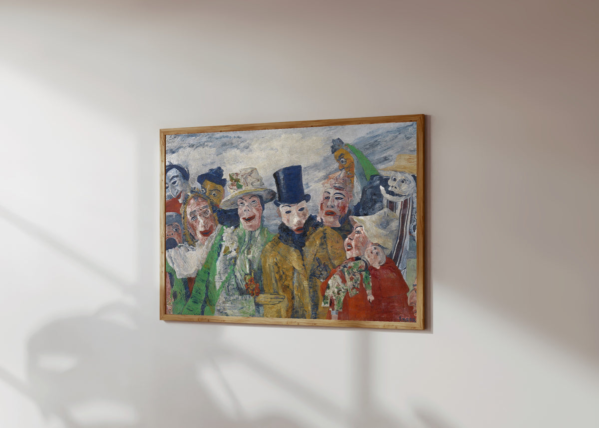 Framed art print of The Intrigue by James Ensor, in a light wood frame on a sunlit white wall, seen at a slight angle