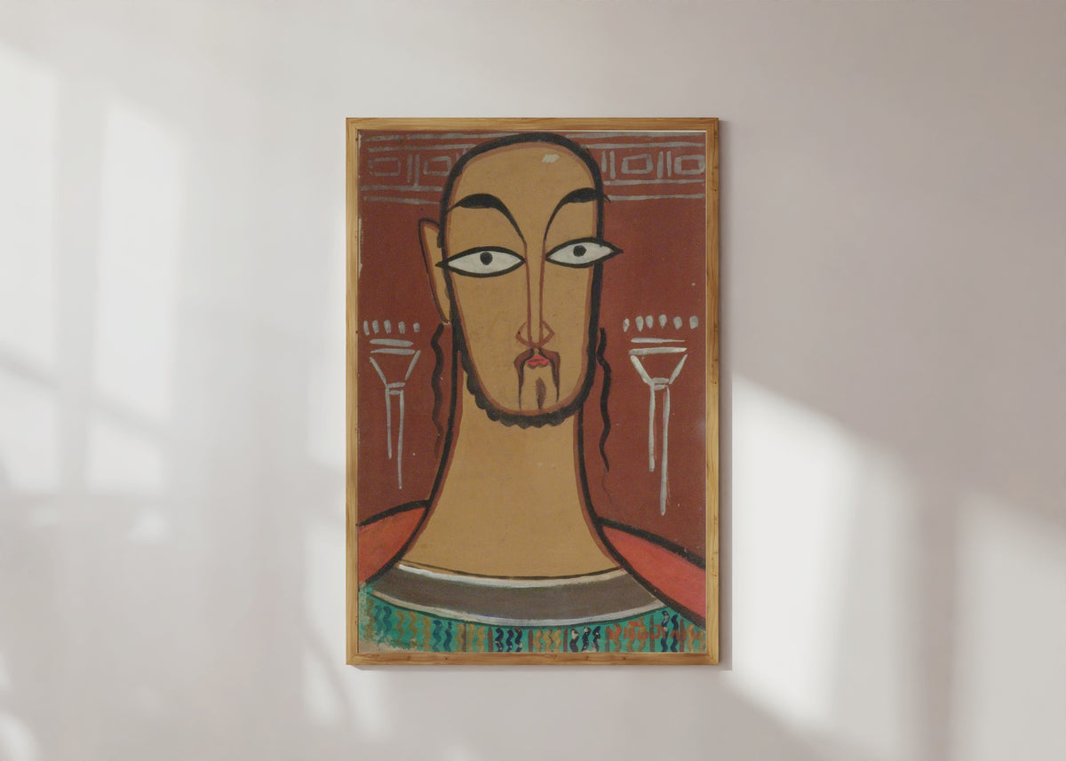 Framed art print of Christ (Jishu) by Jamini Roy, in a light wood frame on a sunlit white wall