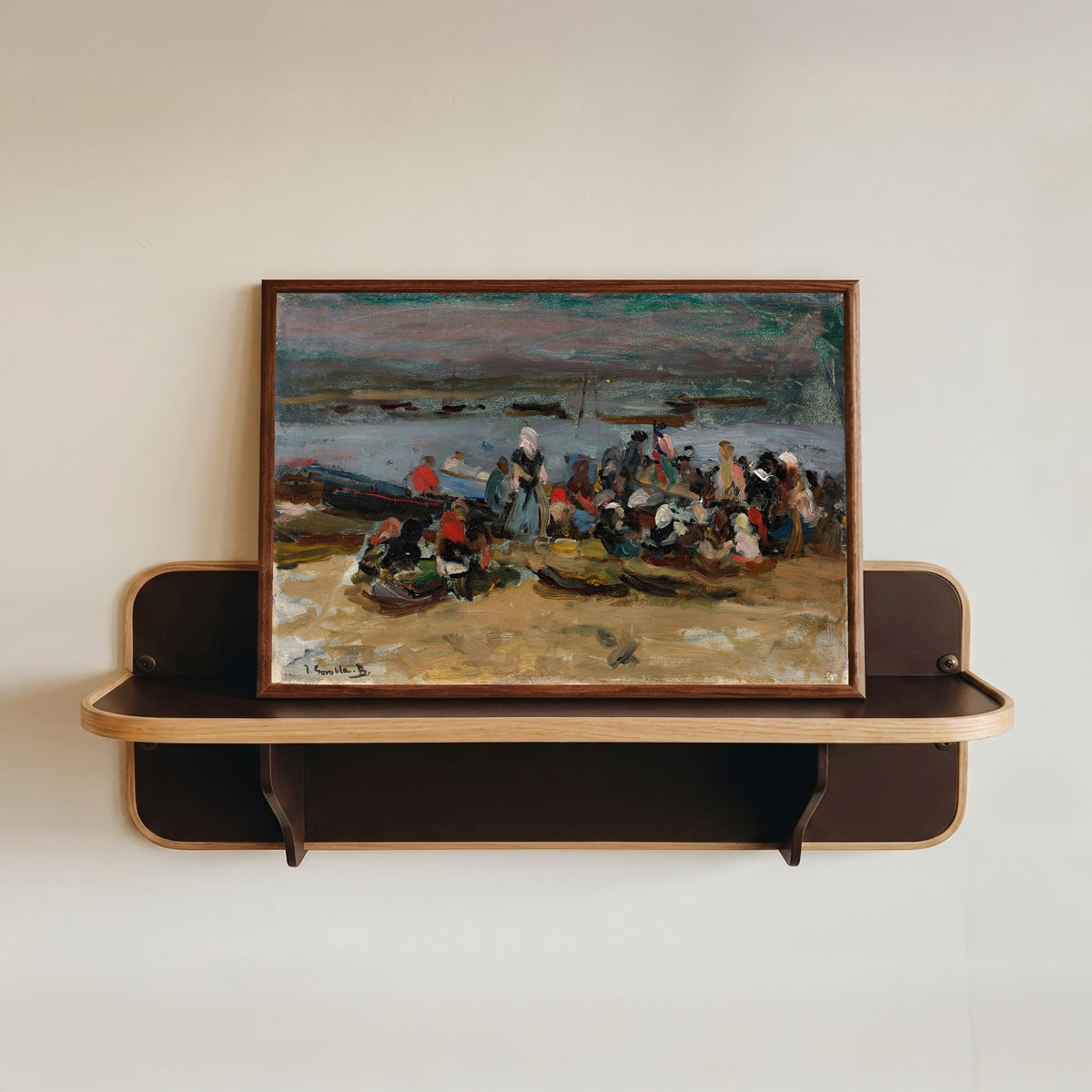 Framed art print of At the Estuary, Asturias (Las Carboneras) by Joaquín Sorolla, in a dark wood frame resting on a wall shelf