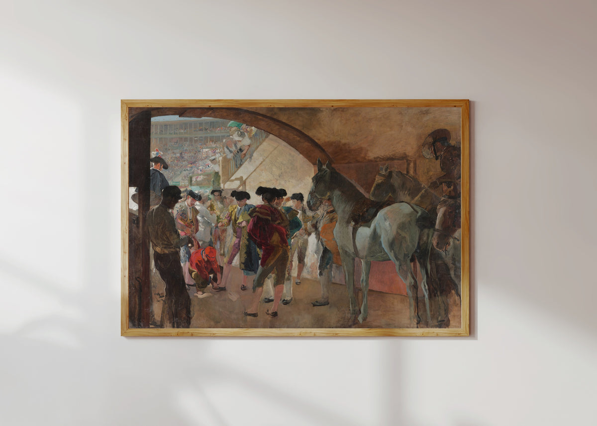 Framed art print of Before the Bullfight (Antes de la corrida) by Joaquín Sorolla, in a light wood frame on a sunlit white wall