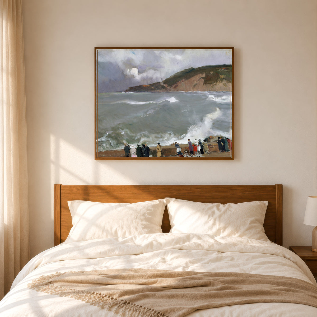 Framed art print of Breakwater, San Sebastián by Joaquín Sorolla, in a slim wood frame above a bed in a sunlit bedroom
