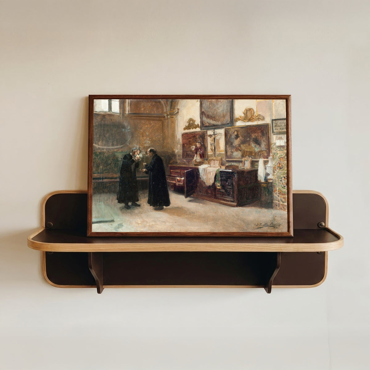 Framed art print of In the Sacristy (En la sacristía) by Joaquín Sorolla, in a dark wood frame resting on a wall shelf