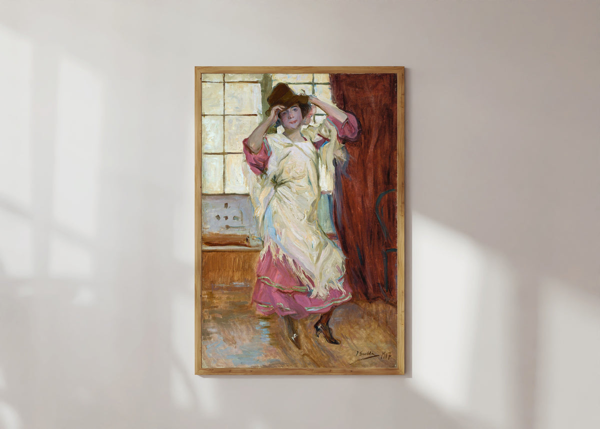 Framed art print of La Bilbainita by Joaquín Sorolla, in a light wood frame on a sunlit white wall