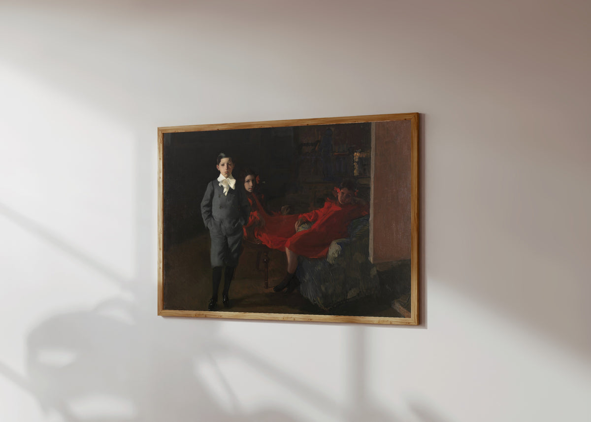 Framed art print of My Children by Joaquín Sorolla, in a light wood frame on a sunlit white wall, seen at a slight angle