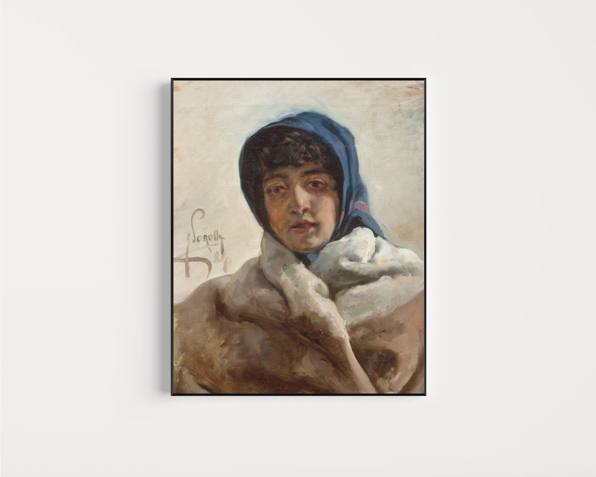 Framed art print of Portrait of a Woman in a Blue Headscarf by Joaquín Sorolla, in a slim black frame on a plain white wall