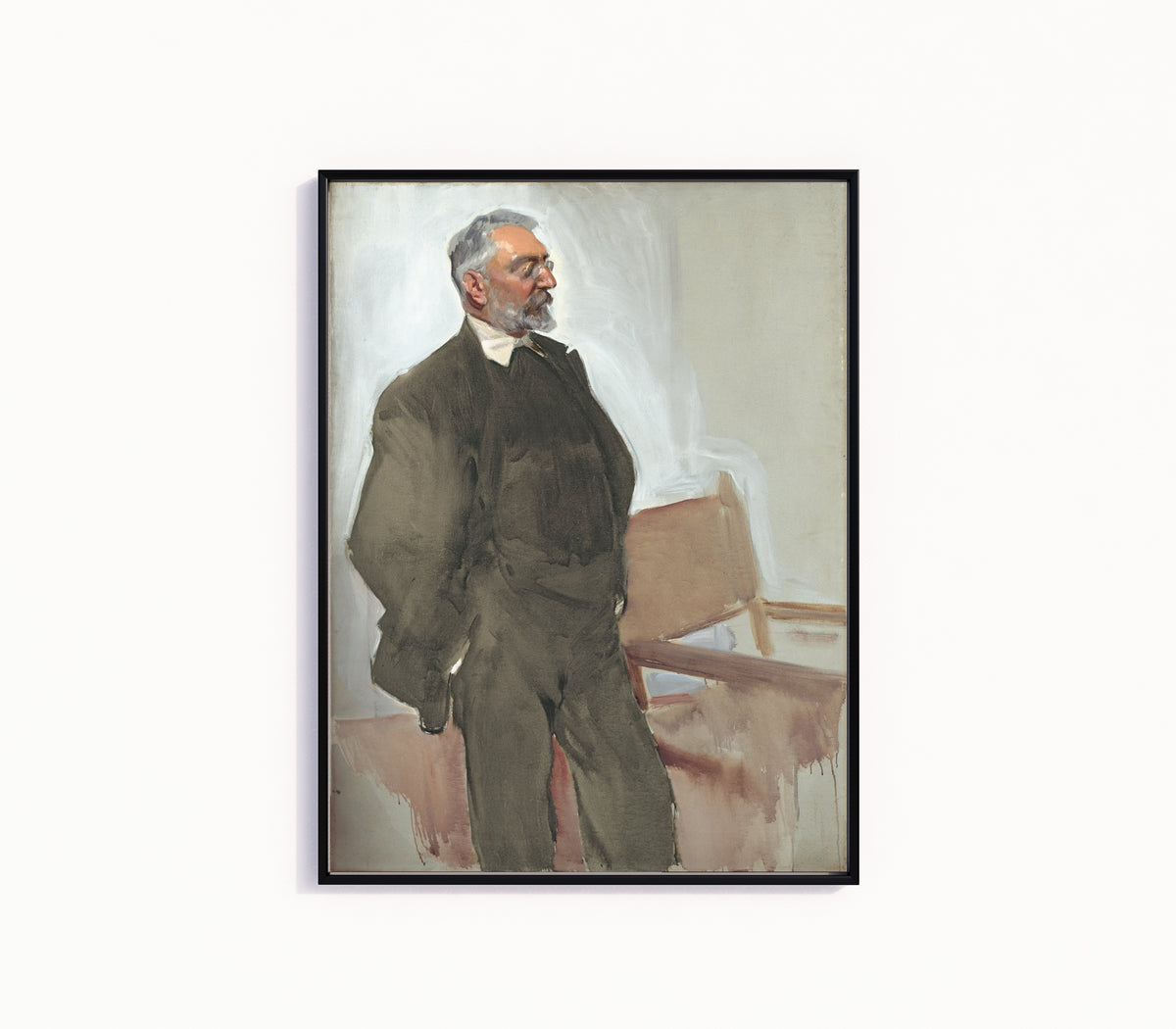 Framed art print of Portrait of Miguel de Unamuno by Joaquín Sorolla, in a slim black frame on a plain white wall