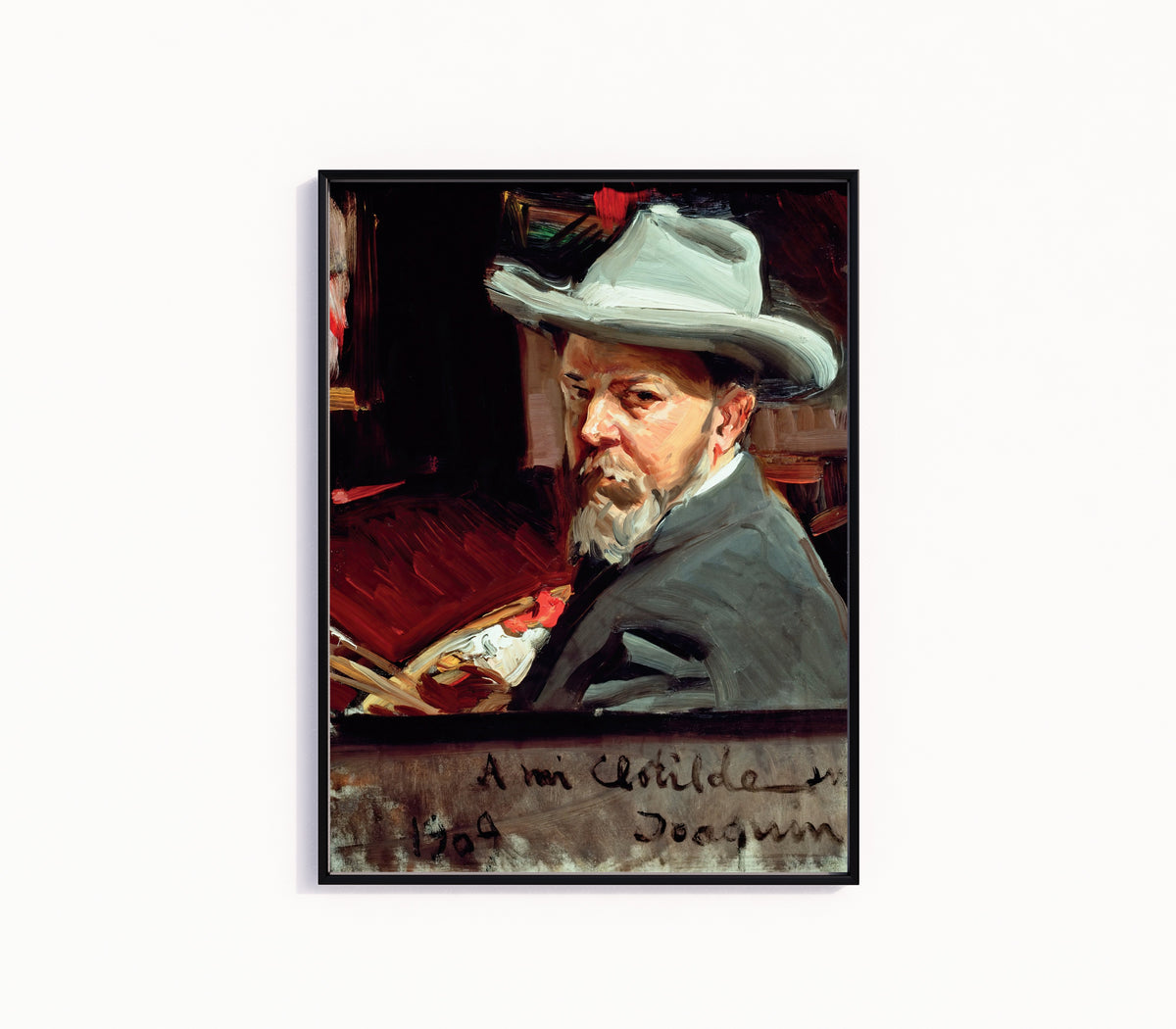 Framed art print of Self Portrait by Joaquín Sorolla, in a slim black frame on a plain white wall