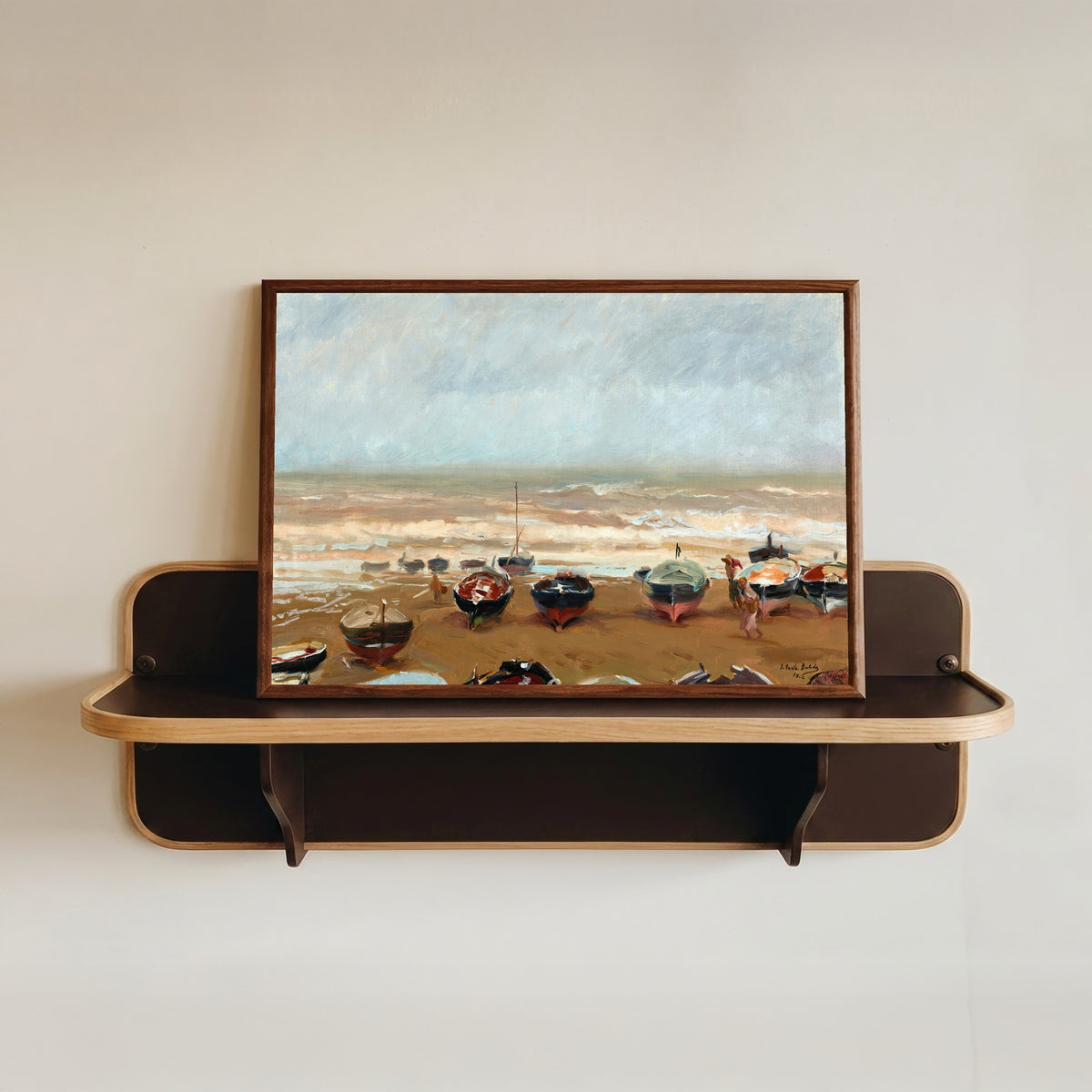 Framed art print of Stormy Afternoon (Tarde tormentosa) by Joaquín Sorolla, in a dark wood frame resting on a wall shelf