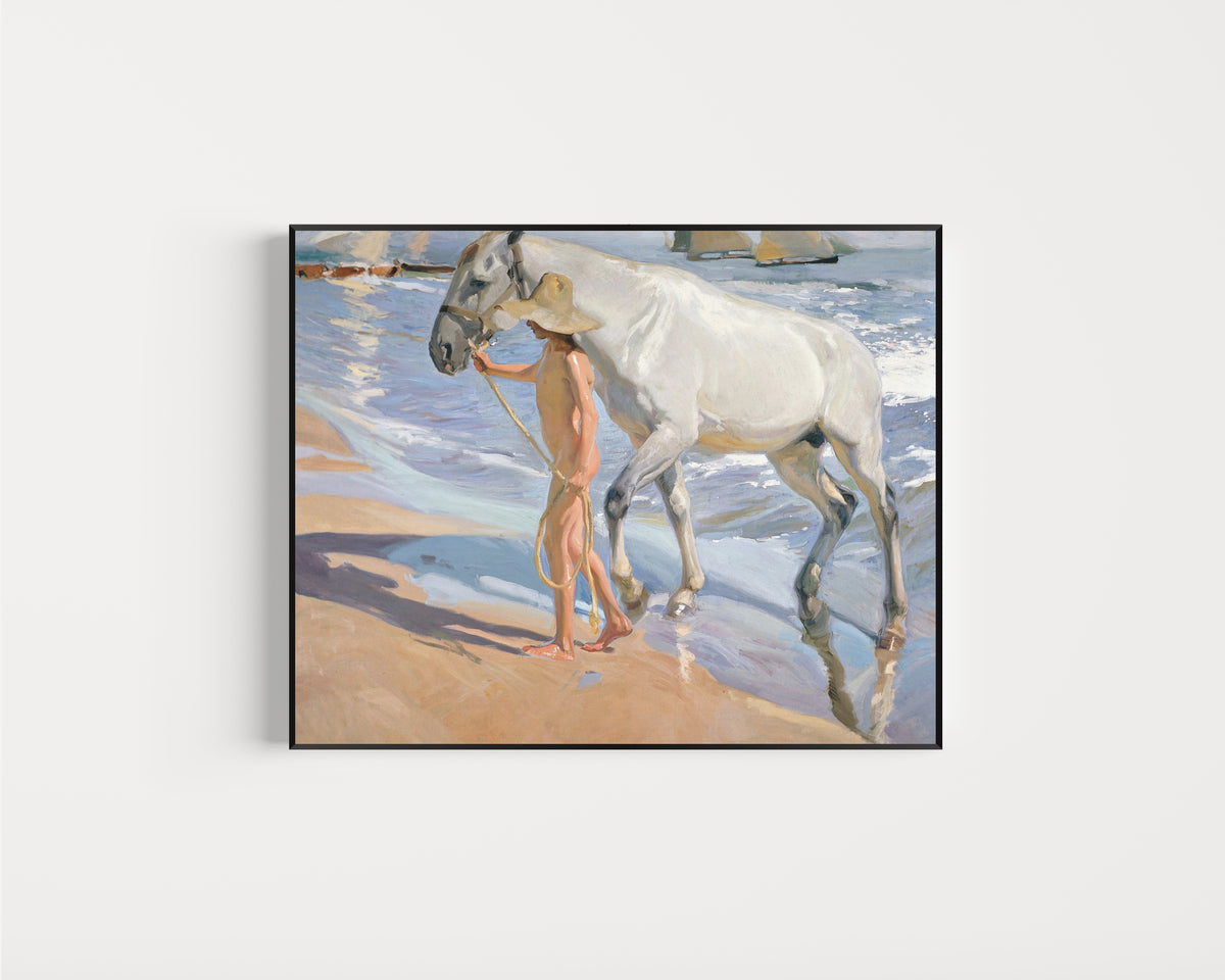 Framed art print of The Horse's Bath by Joaquín Sorolla, in a slim black frame on a plain white wall