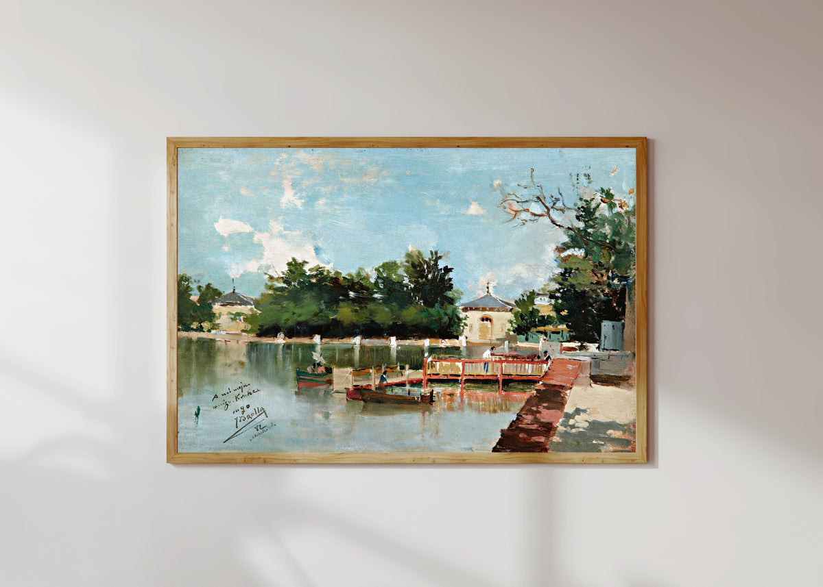 Framed art print of The Jetty in the Retiro Gardens, Madrid by Joaquín Sorolla, in a light wood frame on a sunlit white wall