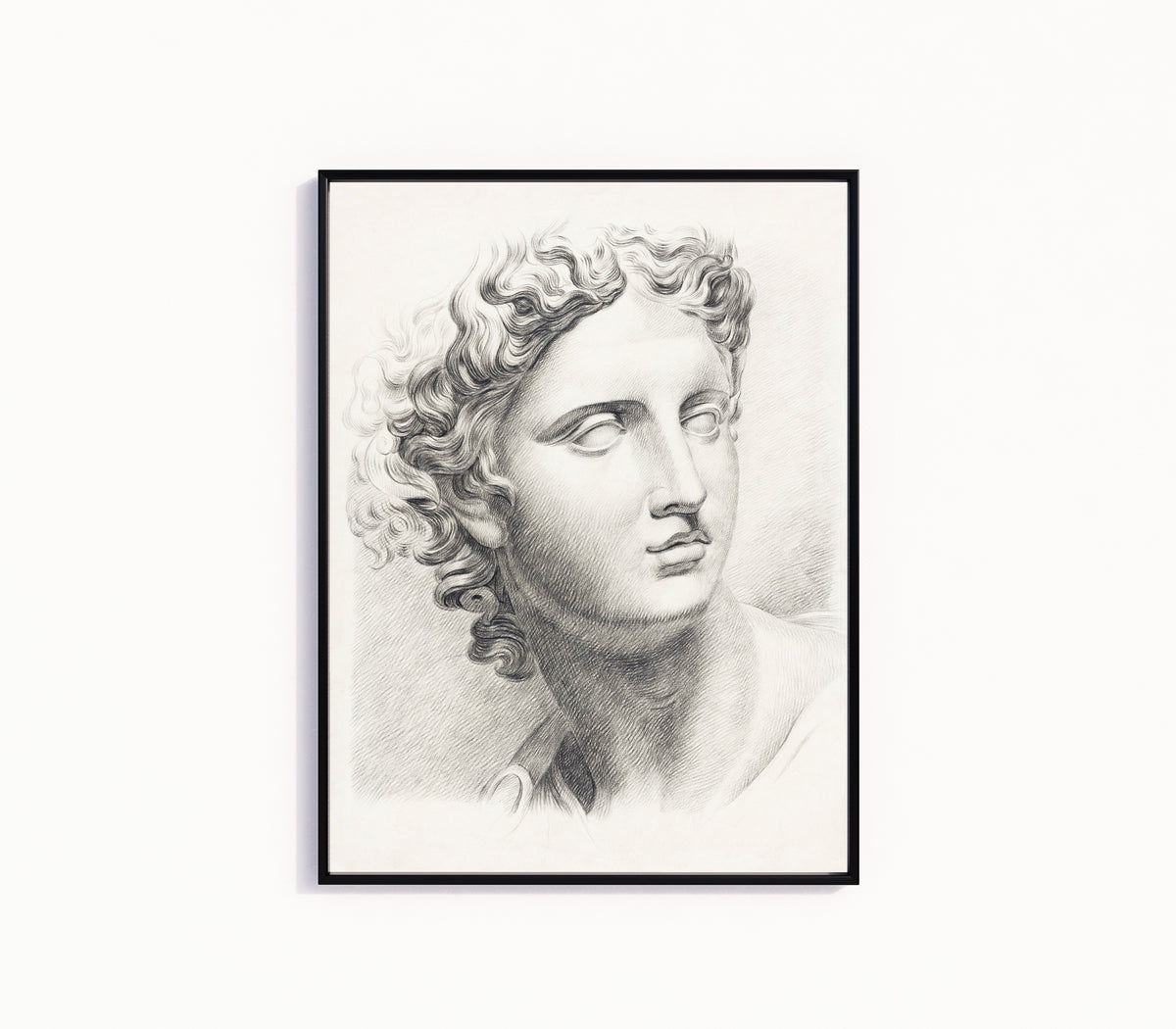 Framed art print of Man's Head by Johannes Tavenraat, in a slim black frame on a plain white wall