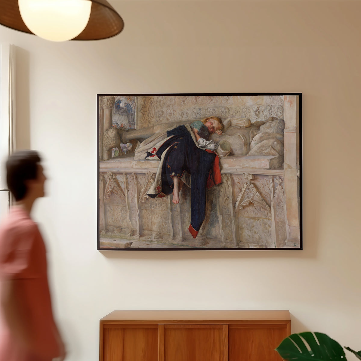Framed art print of L'Enfant du Régiment by John Everett Millais, in a slim black frame on a warm wall in a sunlit room
