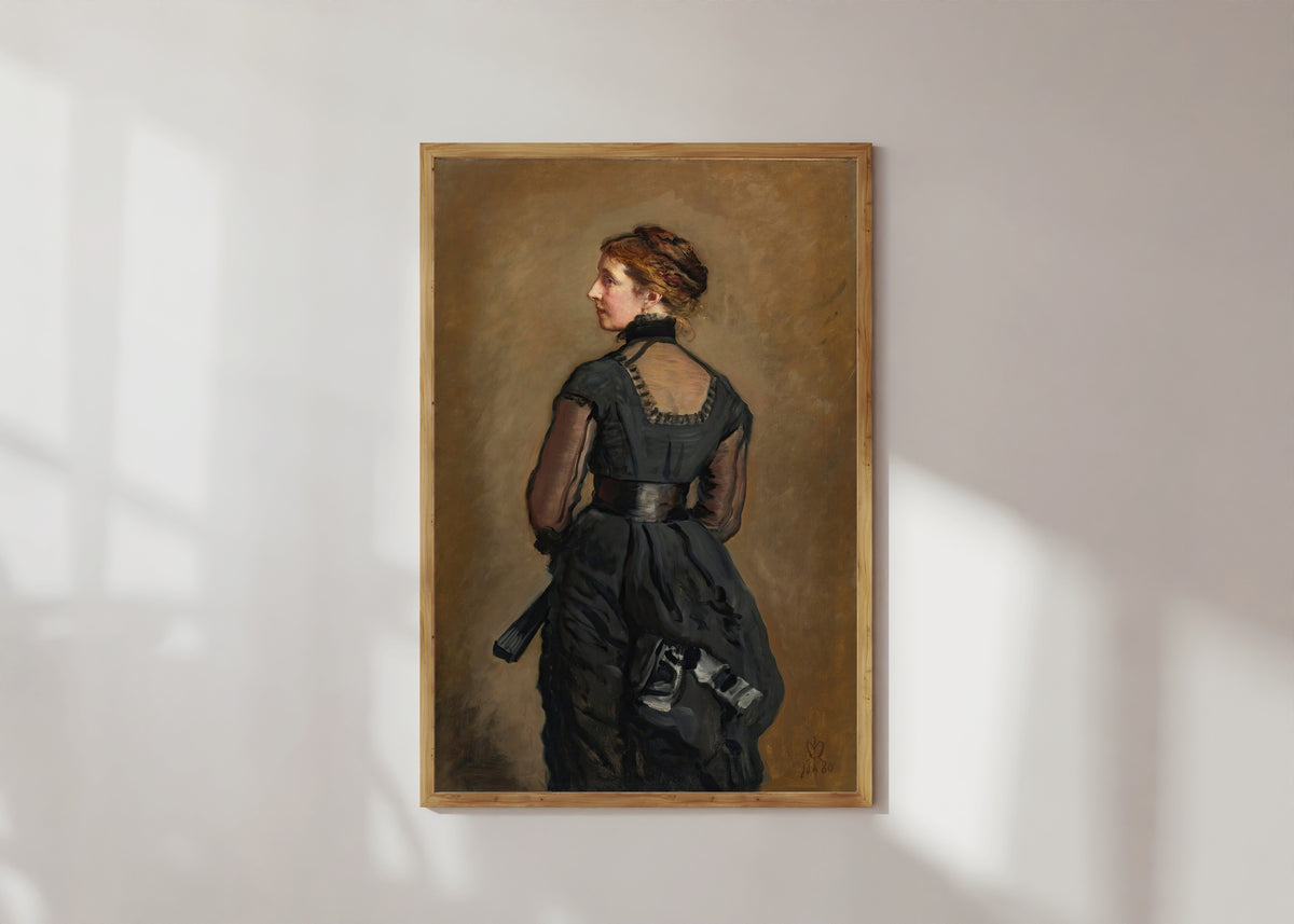 Framed art print of Portrait of Kate Perugini, Daughter of Charles Dickens by John Everett Millais, in a light wood frame on a sunlit white wall