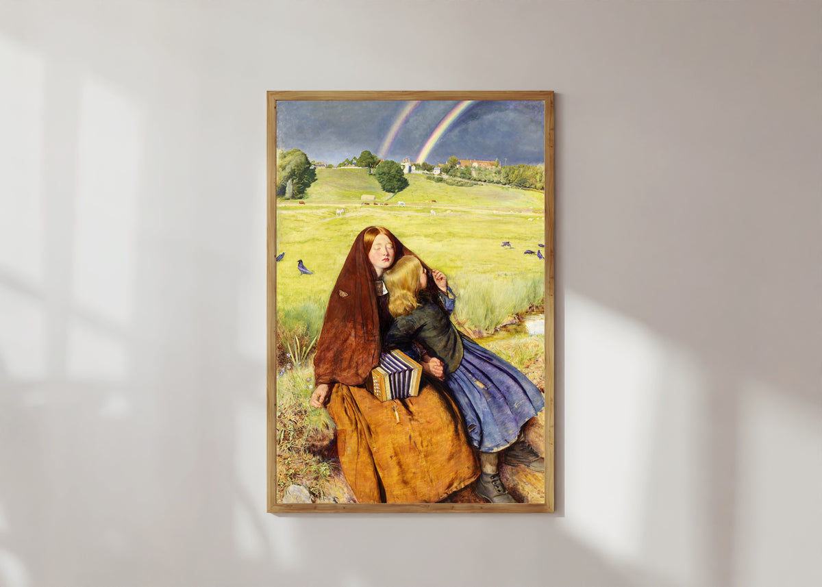 Framed art print of The Blind Girl by John Everett Millais, in a light wood frame on a sunlit white wall