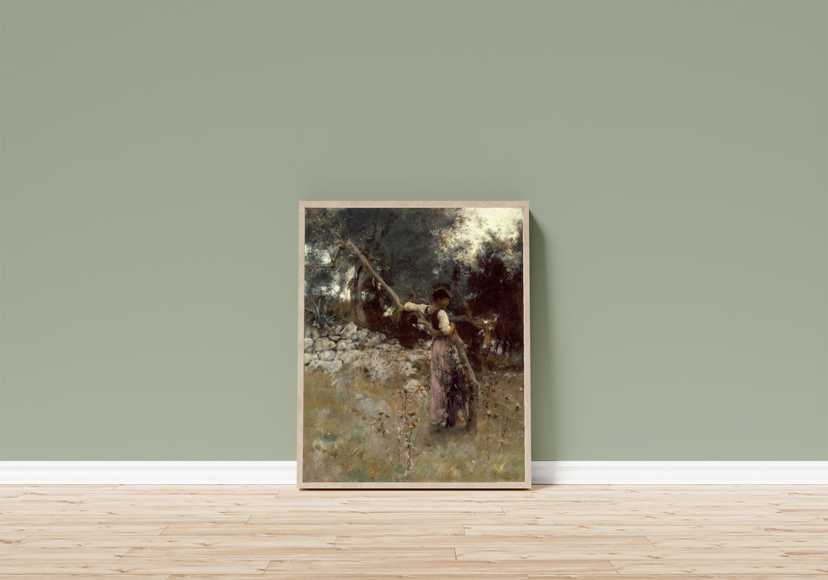 Framed art print of A Capriote by John Singer Sargent, in a light wood frame leaning on a sage green wall above a wooden floor