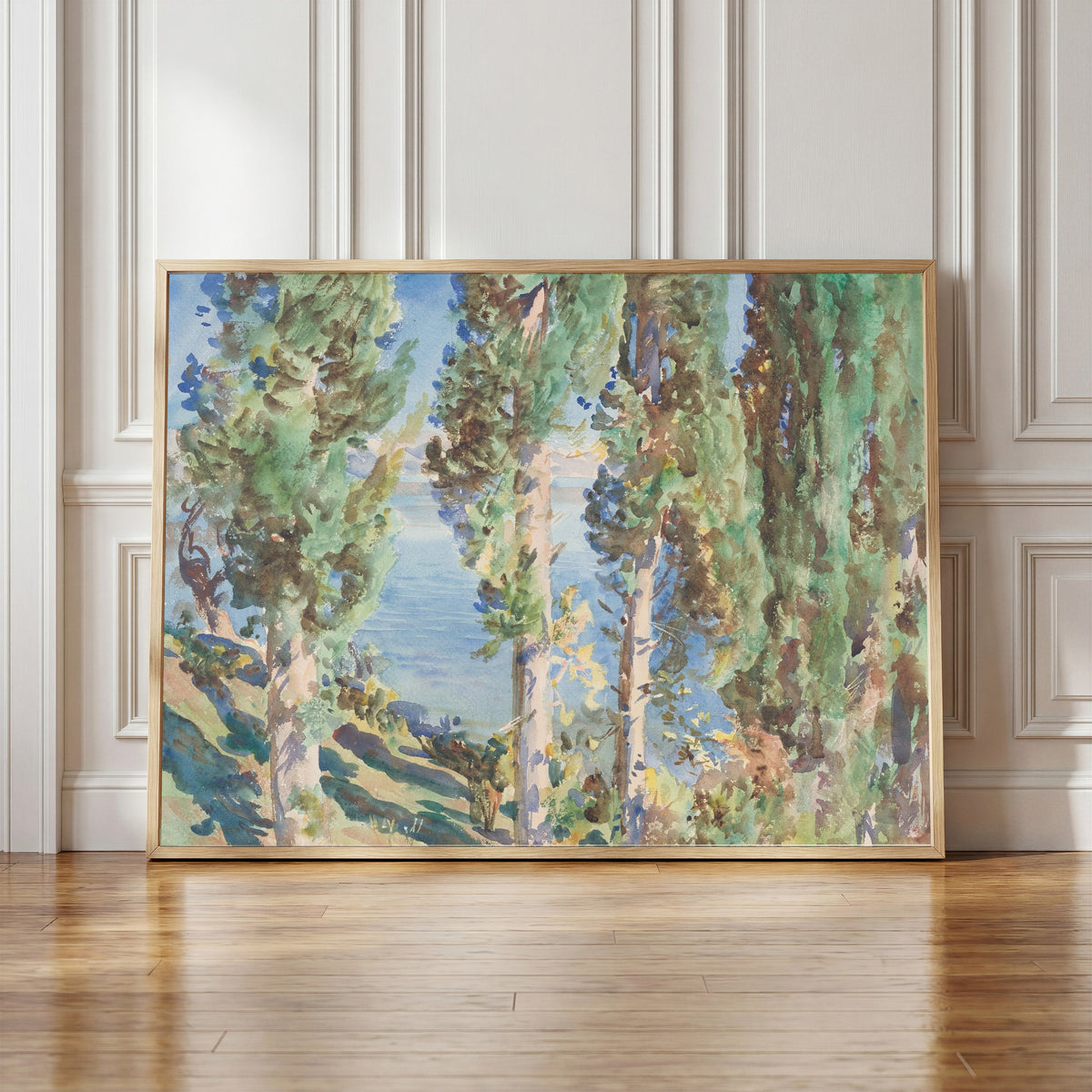 Framed art print of Corfu: Cypresses by John Singer Sargent, in a light wood frame leaning against a panelled white wall