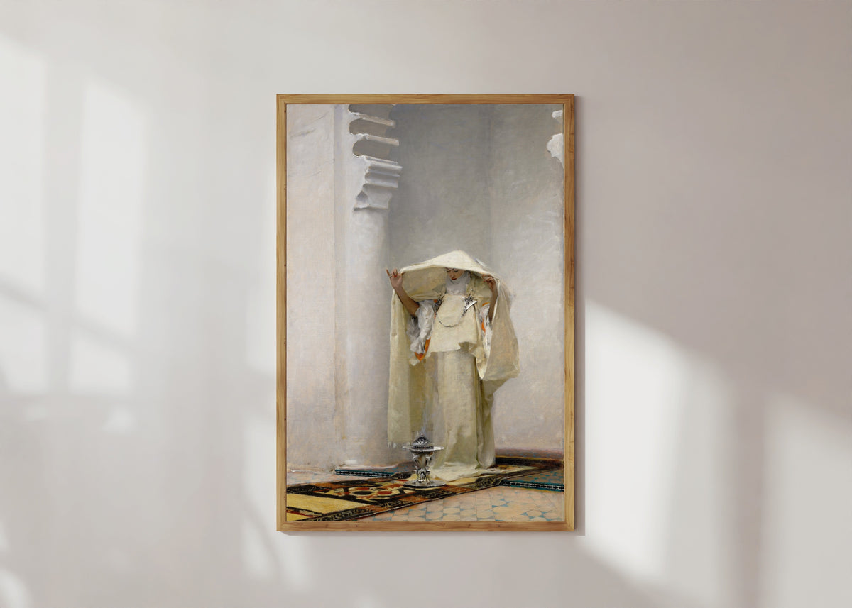 Framed art print of Fumée d'ambre gris (Smoke of Ambergris) by John Singer Sargent, in a light wood frame on a sunlit white wall