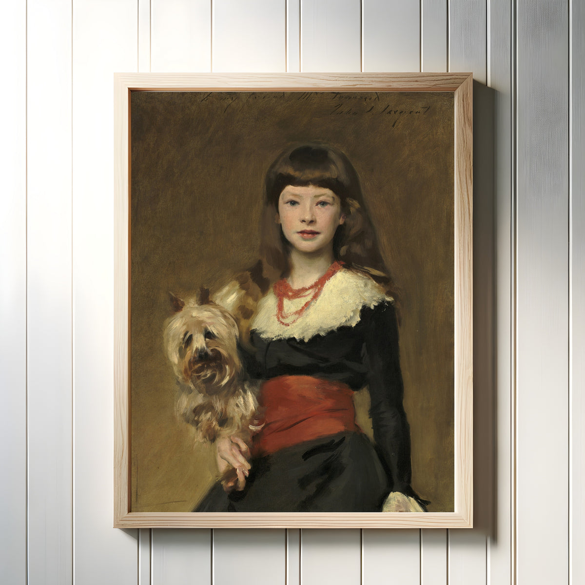 Framed art print of Miss Beatrice Townsend by John Singer Sargent, in a light wood frame on a white panelled wall