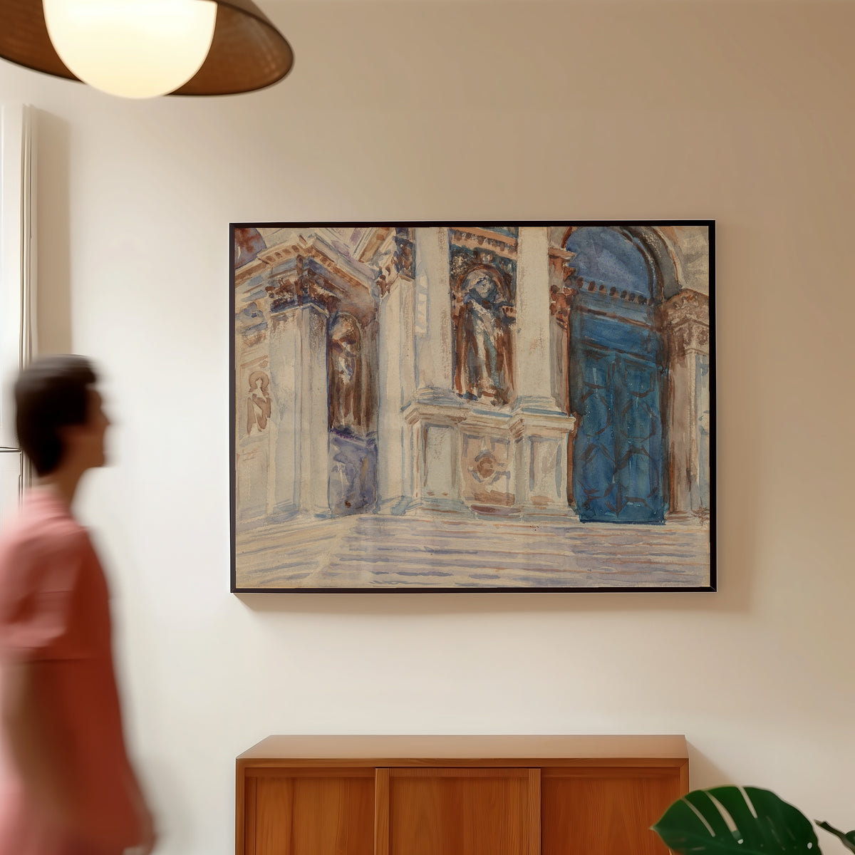 Framed art print of Santa Maria della Salute, Venice by John Singer Sargent, in a slim black frame on a warm wall in a sunlit room