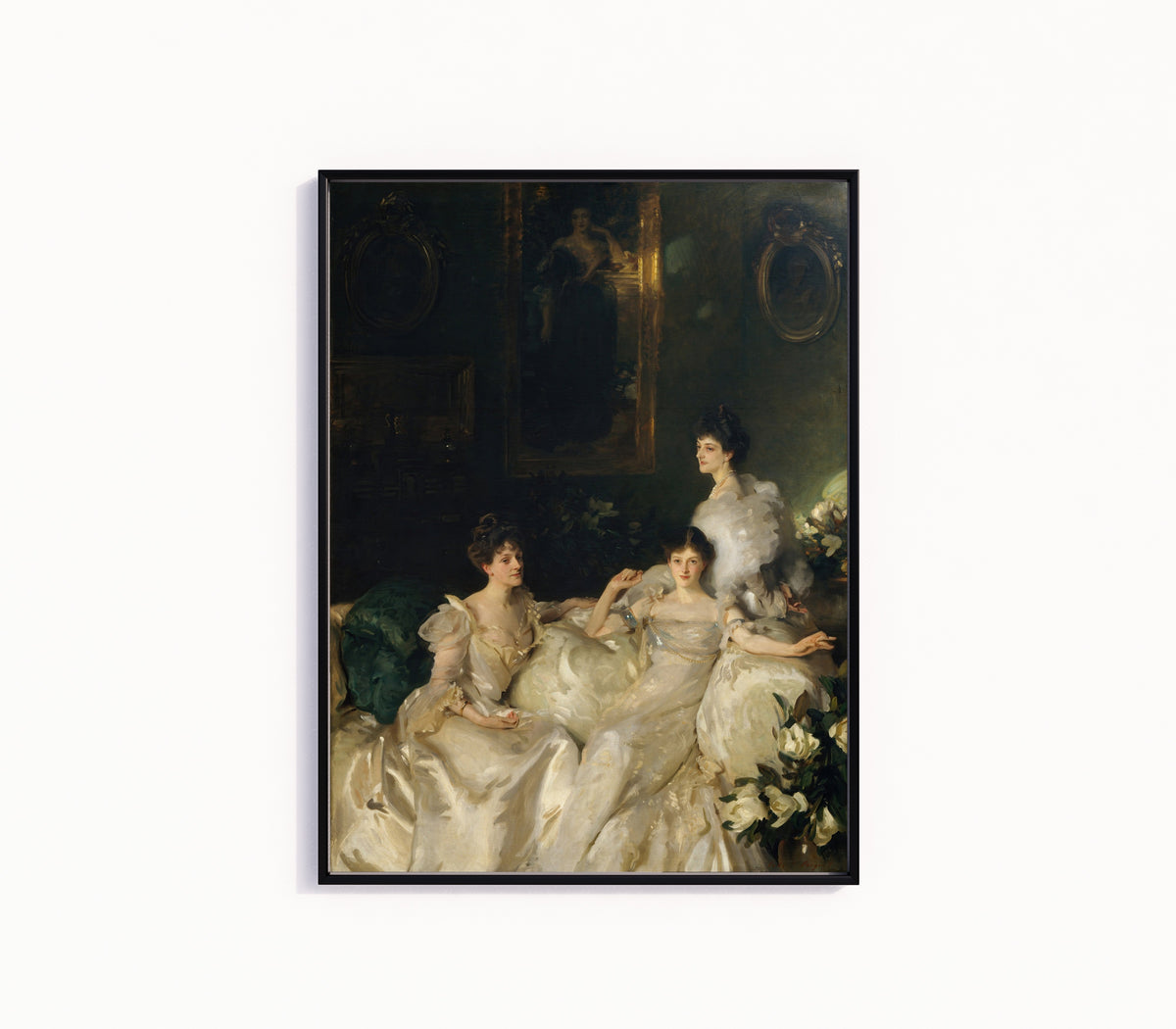 Framed art print of The Wyndham Sisters by John Singer Sargent, in a slim black frame on a plain white wall